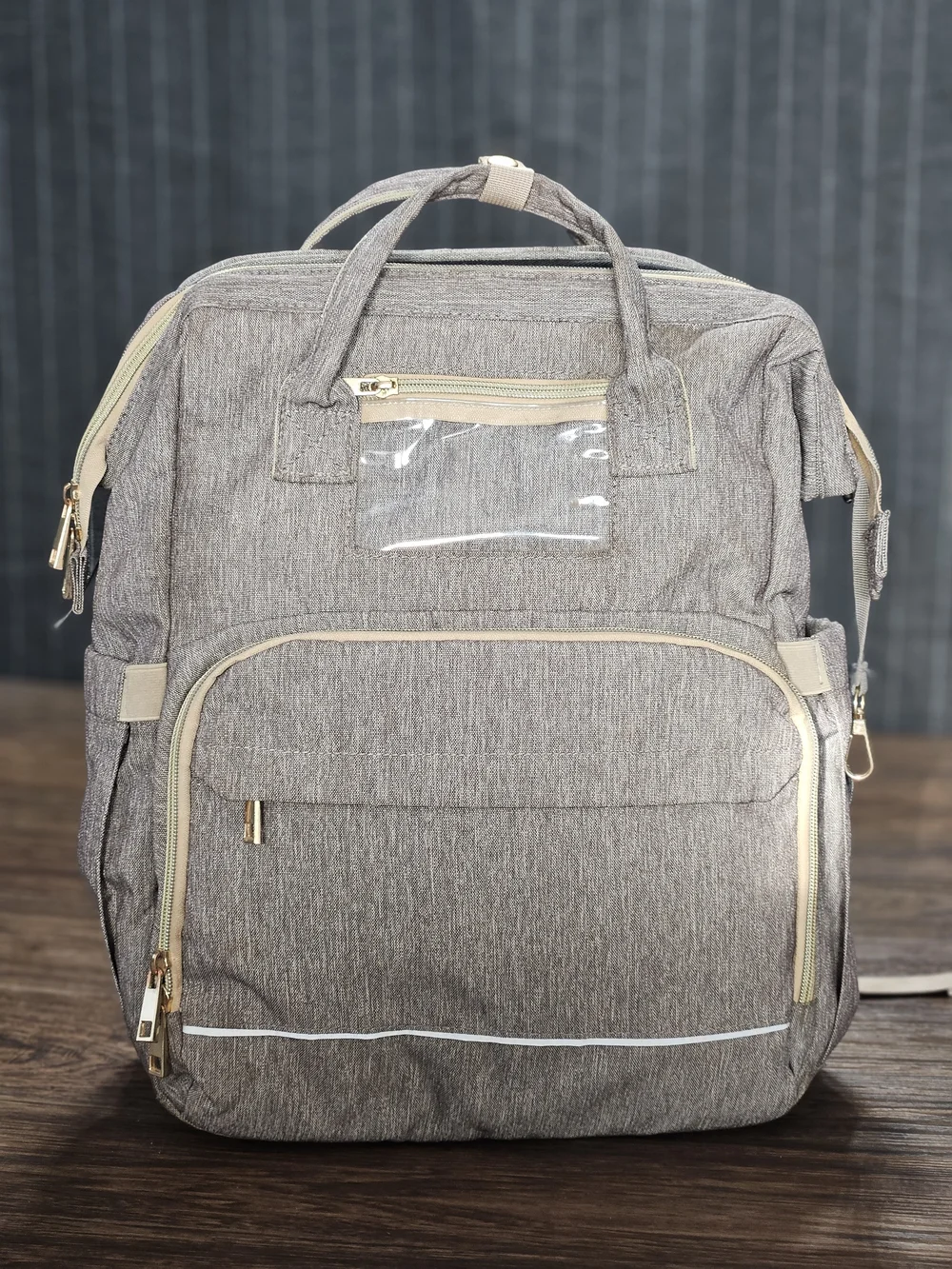 Source Unknown tan gray